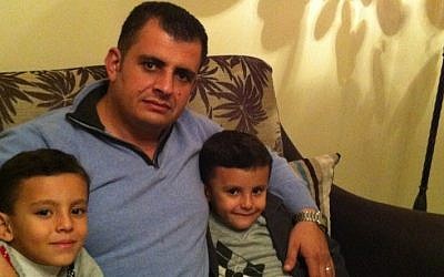 Ibrahim Barzak with his sons before leaving Gaza. (photo credit: Courtesy Ibrahim Barzak)