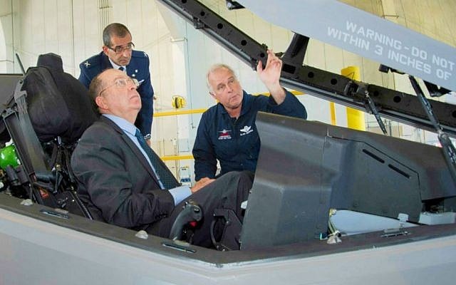 Lockheed Martin Aeronautics Company Chief Test Pilot Alan Norman briefs Israel’s Minister of Defense Moshe Ya'alon in the cockpit of an F-35 while IAF Brig. Gen. Ya’akov Shaharabani, IAF Air Attache to the United States, observes. (Photo credit: courtesy: Lockheed Martin/ Angel Delcueto)