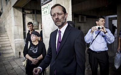 Right-wing parliament member Moshe Feiglin seen outside the closed entrance to the temple Mount in Jerusalem's Old City on October 30, 2014. (photo credit: Yonatan Sindel/Flash90)
