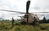 An IDF search and rescue team searching for the bodies of the victims from the helicopter crash in Romania on July 28, 2010. (IDF Spokesperson/Flash90)