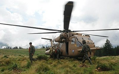 An IDF search and rescue team searching for the bodies of the victims from the helicopter crash in Romania on July 28, 2010. (IDF Spokesperson/Flash90)