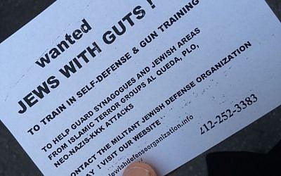 A radical element at the October 20, 2014 pre-production of 'the Death of Klinghoffer' protest distributed flyers calling for 'Jews with guts' to learn shooting with the Jewish Defense League. (Jordan Hoffman/The Times of Israel)
