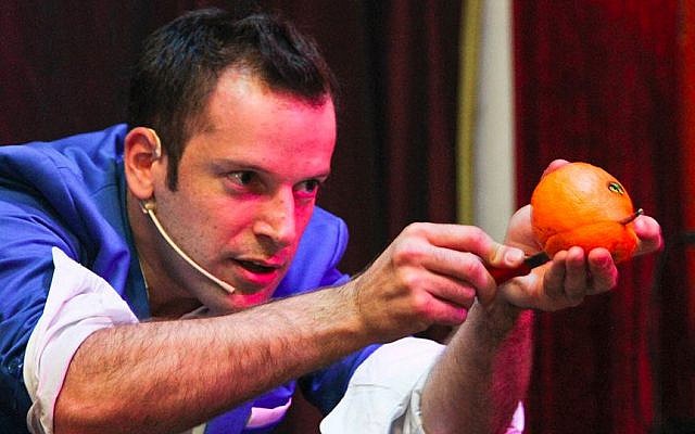 Magician Itai Pinki on stage at Sorcerers' Night. (photo credit: courtesy Sorcerers' Night)