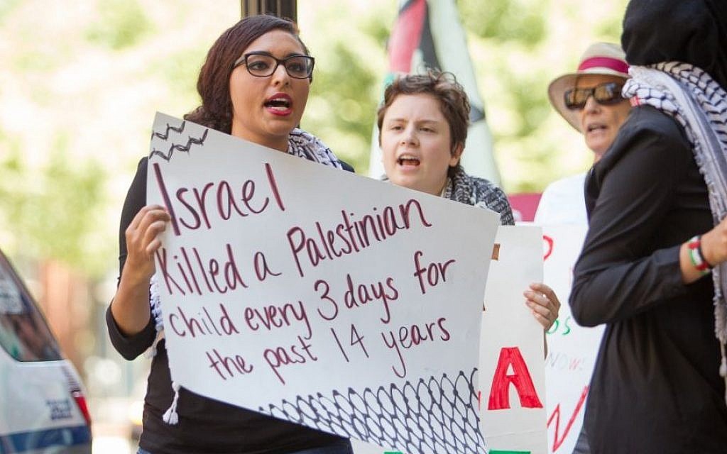 Anti-Israel protesters at a Boston rally held during Operation Protective Edge in summer 2014 (photo credit: Elan Kawesch) Anti-Israel protesters at a Boston rally held during Operation Protective Edge in summer 2014 (photo credit: Elan Kawesch)
