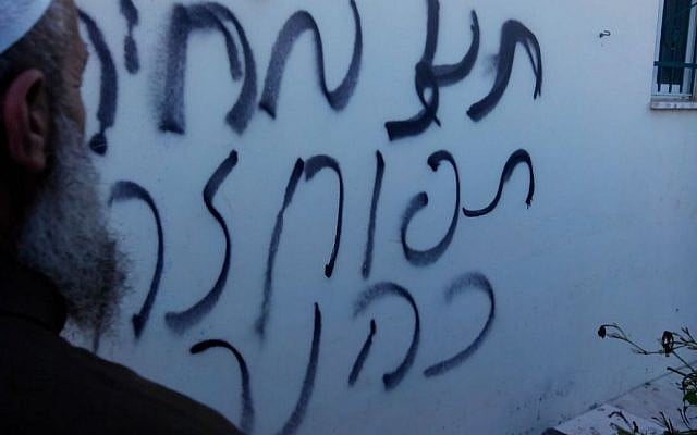 Nationalist graffiti spray-painted on a West Bank mosque, near Nablus, on October 14, 2014. (photo credit: courtesy Rabbis for Human Rights) Nationalist graffiti spray-painted on a West Bank mosque, near Nablus, on October 14, 2014. (photo credit: courtesy Rabbis for Human Rights)
