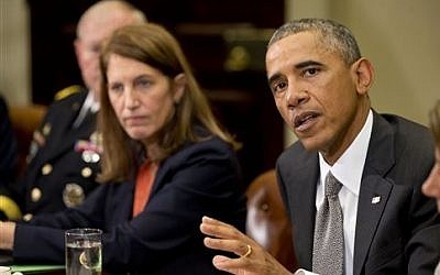 President Barack Obama meets with members of his national security team and senior staff to receive an update on the Ebola outbreak in West Africa, Monday, Oct. 6, 2014, in the Roosevelt Room of the White House in Washington. (photo credit: AP Photo/Jacquelyn Martin)