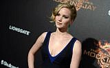 FILE - In this May 17, 2014 file photo, Jennifer Lawrence appears at the "Hunger Games: Mockingjay - Part 1" party at the 67th international film festival, Cannes, southern France. (Photo by Arthur Mola/Invision/AP, File)