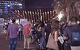 Israelis rallying for emigration to Berlin in Tel Aviv, October 2014 (Screen capture: Channel 2)