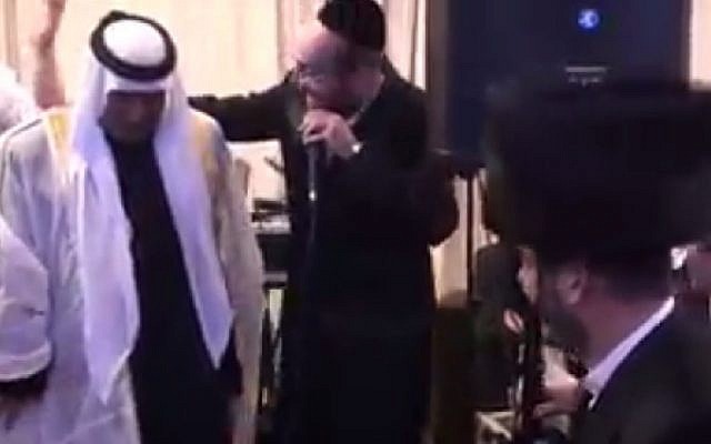 Screenshot from a video posted to Facebook showing Bedouin sheikh Aqel Al-Atrash dancing at an ultra-Orthodox Jewish wedding. (Screen capture: Facebook) Screenshot from a video posted to Facebook showing Bedouin sheikh Aqel Al-Atrash dancing at an ultra-Orthodox Jewish wedding. (Screen capture: Facebook)