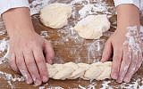 Thousands of Jews worldwide are reportedly planning to participate in inclusive Sabbath observance activities on October 24-25. (Illustrative photo of challah baking via Shutterstock)