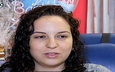 Screenshot from a Channel 10 interview with Sivan Baror, the widow of Maj. Tzafrir Baror who died during Operation Protective Edge,  after the birth of their son.