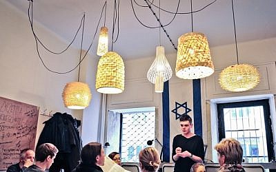 A scene inside the Tel Aviv Cafe in Warsaw, whose menu is full of Tel Aviv favorites like falafel and limonana. (photo credit: courtesy Tel Aviv Cafe)