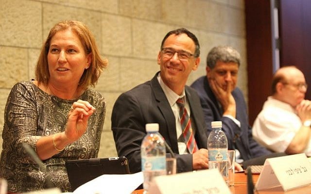 Justice Minister Tzipi Livni (left) makes a point at Israel Academy of Sciences and Humanities conference as State Prosecutor Shai Nitzan, to the immediate right, looks on. October 20, 2014. (photo credit: Michal Fattal) Justice Minister Tzipi Livni (left) makes a point at Israel Academy of Sciences and Humanities conference as State Prosecutor Shai Nitzan, to the immediate right, looks on. October 20, 2014. (photo credit: Michal Fattal)