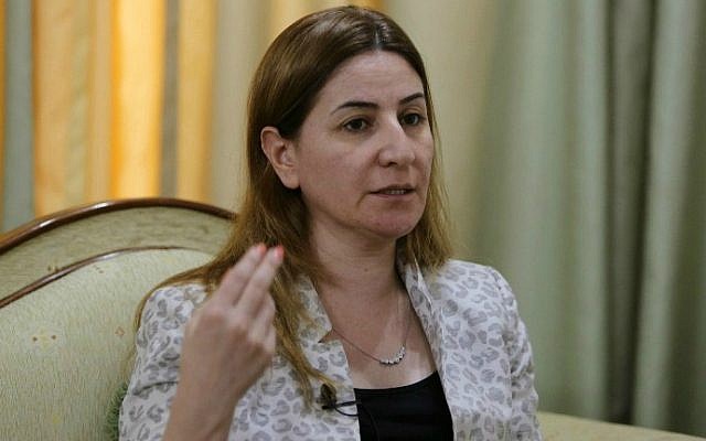 Iraq's only Yazidi member of Parliament, Vian Dakhil, answers questions during an interview on September 20, 2014 in Erbil, the capital of the Kurdish autonomous region in northern Iraq. (photo credit: Mohammed Sawaf/AFP)