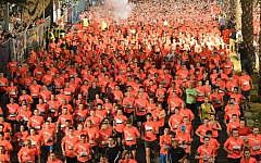Hundreds of runners at last year's Tel Aviv Night Run; start training for next year's run (Courtesy City of Tel Aviv-Yafo)
