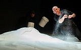 Mounds of salt make up the set of 'Salt of the Earth,' Hazira's media-rich play that will be performed at the Brooklyn Academy of Music this week (photo credit: Yair Meyuhas)