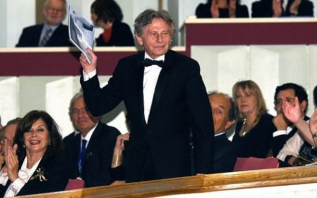 Film director Roman Polanski waving as he attends a gala concert at the Grand Theatre - National Opera in Warsaw, Poland, on October 27, 2014. (photo credit: AFP PHOTO / PAP/ RADEK PIETRUSZKA) Film director Roman Polanski waving as he attends a gala concert at the Grand Theatre - National Opera in Warsaw, Poland, on October 27, 2014. (photo credit: AFP PHOTO / PAP/ RADEK PIETRUSZKA)