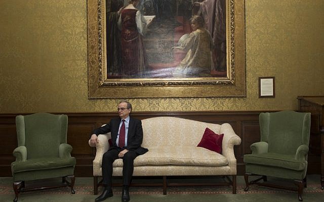 Syrian National Coalition President, Hadi al-Bahra, waits to greet British Foreign Minister Philip Hammond at the Foreign & Commonwealth Office in London, on November 10, 2014.  (photo credit: AFP/ANDREW COWIE/POOL) 