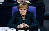 German Chancellor Angela Merkel attends a session of the Bundestag (Lower House of Parliament) in Berlin on November 26, 2014. (photo credit: AFP/CLEMENS BILAN)