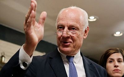 Italian UN envoy Staffan de Mistura waves during a press conference in Damascus on November 11, 2014. (photo credit: AFP/LOUAI BESHARA)