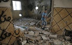 The home of Palestinian terrorist Abdelrahman al-Shaludi in East Jerusalem after it was destroyed by Israeli authorities on November 19, 2014. (AFP/Ahmad Gharabli)