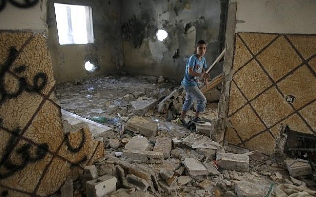 The home of Palestinian terrorist Abdelrahman al-Shaludi in East Jerusalem after it was destroyed by Israeli authorities on November 19, 2014. (AFP/Ahmad Gharabli)