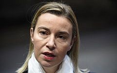 European Union's foreign policy chief, Federica Mogherini, speaks to journalists as she arrives for a Foreign Affairs Council meeting at the EU Headquarters in Brussels, on November 17, 2014. (photo credit: AFP/JOHN THYS)