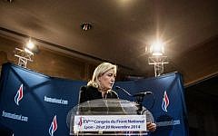 France's far-right National Front (FN) party's leader Marine Le Pen delivers a speech in front of journalists, on November 29, 2014 in Lyon, during the 15th congress of the party. (photo credit: AFP/JEFF PACHOUD)