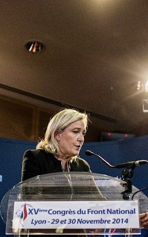 France's far-right National Front (FN) party's leader Marine Le Pen delivers a speech in front of journalists, on November 29, 2014 in Lyon, during the 15th congress of the party. (photo credit: AFP/JEFF PACHOUD) 