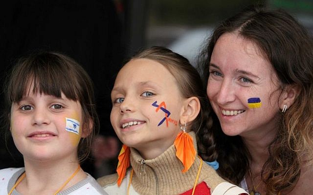 Participants young and old flaunt their Jewish and Ukrainian pride at the Limmud FSU conference in Lviv, Ukraine, November 2014. (photo credit: Yossi Aloni)