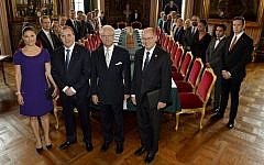 Sweden's new government posing together with front from left, Crown Princess Victoria, Prime Minister Stefan Lofven, King Carl Gustaf and parliament speaker Urban Ahlin, Oct. 3, 2014. (photo credit: AP Photo/Anders Wiklund)