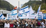 Thousands of protesters attend a rally against anti-Semitism near the Brandenburg Gate in Berlin, Sunday, September 14, 2014. (AP Photo/Markus Schreiber, Pool)