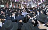 Circle dancing at the annual International Conference of Chabad-Lubavitch Emissaries, November 23, 2014. (Adam Ben Cohen/Chabad.org)