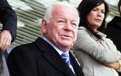 David Whelan watching a Wigan Athletic FC football match May 3, 2010 (photo credit: Wikimedia Commons, CC BY 2.0, Dan Farrimond)