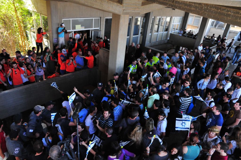 Jewish students holding a rally at Haifa University in protest of a meeting being held by Knesset Member Hanin Zoabi (Balad) with Arab student activists (photo credit: Shay Levy/Flash 90) Jewish students holding a rally at Haifa University in protest of a meeting being held by Knesset Member Hanin Zoabi (Balad) with Arab student activists (photo credit: Shay Levy/Flash 90)