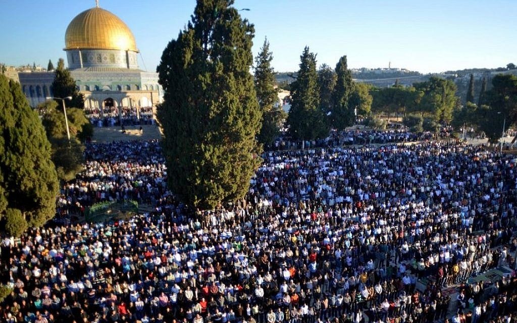 Thousands of Palestinians pray outside Al-Aqsa Mosque, atop the Temple Mount in Jerusalem's Old City, on the Muslim holiday of Eid Al Adha in October 2014. (Sliman Khader/FLASH90) Thousands of Palestinians pray outside Al-Aqsa Mosque, atop the Temple Mount in Jerusalem's Old City, on the Muslim holiday of Eid Al Adha in October 2014. (Sliman Khader/FLASH90)