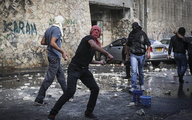 Palestinian youth clash with Israeli police in East Jerusalem, October 30, 2014. (photo credit: Hadas Parush/ Flash90) 