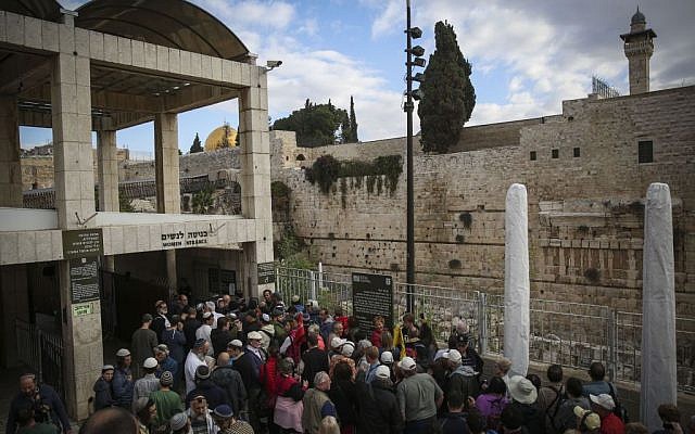 Right wing activists wait to get permission to enter the Temple Mount compound, in a group visit in honor of the Temple Mount Movement leader, Yehuda Glick, one week after he was shot, on November 5, 2014.  (Photo credit: Hadas Parush/Flash90)