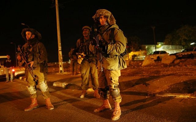 Illustrative photo of IDF soldiers near the Gush Etzion Junction, south of Jerusalem, November 5, 2014. (Nati Shohat/Flash90) Illustrative photo of IDF soldiers near the Gush Etzion Junction, south of Jerusalem, November 5, 2014. (Nati Shohat/Flash90)