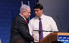 Likud MK Danny Danon (R) and Prime Minister Benjamin Netanyahu seen at the Likud party conference at Airport City conference center near the city of Modiin on November 9, 2014. (photo credit: Flash90)