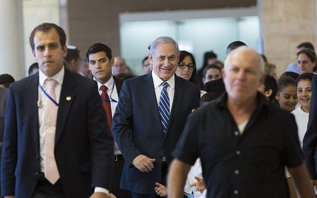 Prime Minister Benjamin Netanyahu (center) in the Israeli parliament, November 10, 2014. (photo credit: Yonatan Sindel/Flash90) Prime Minister Benjamin Netanyahu (center) in the Israeli parliament, November 10, 2014. (photo credit: Yonatan Sindel/Flash90)