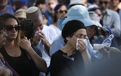 Friends and family seen mourning during the funeral ceremony of Dalia Lemkus at the Jewish settlement of Tekoa in the West Bank on November 11, 2014. (photo credit: Hadas Parush/Flash90)
