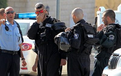 Police at the site where a large fight broke out between local Muslim and Druze residents in the Abu Snan village in northern Israel, November 15, 2014. (photo credit: Flash90)