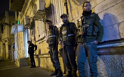 Border Police at the scene of the stabbing on Hanevi'im Street in Jerusalem, November 16, 2014. (photo credit: Yonatan Sindel/Flash90)