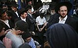 Mourners attend the funerals of four Jewish men murdered at prayer in a Har Nof synagogue in Jerusalem by Palestinian terrorists on November 18, 2014. (Photo credit: Hadas Parush/Flash90)