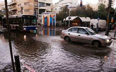 Cars drive in the rain in Tel Aviv on November 25, 2014. (photo credit: Flash90)