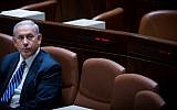 Prime Minister Benjamin Netanyahu seen during a plenum session in the Israeli parliament on the “Jewish state” bill, on November 26, 2014. (photo credit: Miriam Alster/FLASH90)