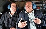 Defense Minister Moshe Ya'alon (left), and then-Maj. Gen. Gadi Eisenkot when Eisenkot learned he had won the appointment to head the Israel Defense Forces, November 27, 2014. (Ariel Hermoni/Ministry of Defense)
