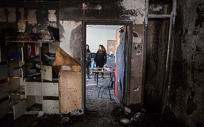 A burned classroom in a bilingual Hebrew-Arabic school in Jerusalem on November 30, 2014. (Photo credit: Yonatan Sindel/Flash90)