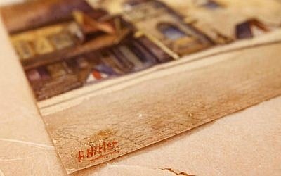 The signature 'A. Hitler' is on a picture titled 'The Old City Hall' that was painted by Adolf Hitler in Nuremberg, Germany, November 19, 2014.  (AP/Michael Probst/File)